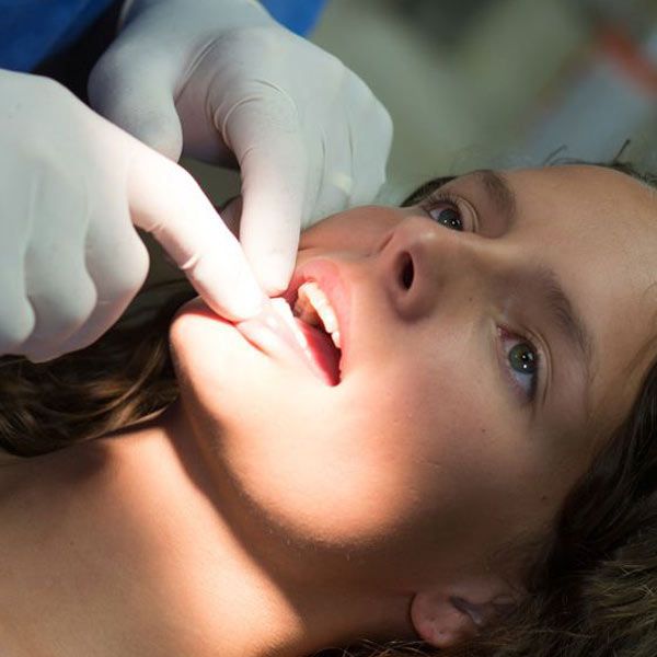 Patient in exam chair